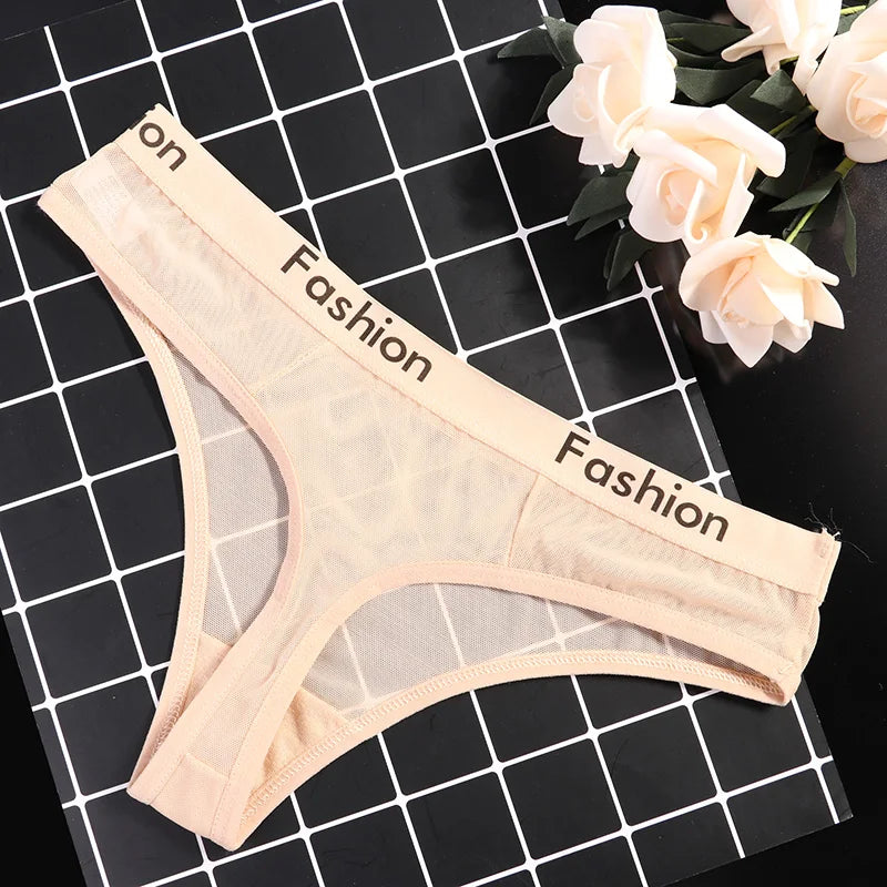 Sous-vêtements sexy en maille transparente femme | String en maille fine pour femme | Slip transparent élégant et confortable | Lingerie sensuelle en tissu respirant | Sous-vêtements invisibles et séduisants | Culottes en maille pour usage quotidien | Lingerie fine féminine en dentelle légère | String sexy pour occasions spéciales | Sous-vêtements confortables et glamour | Lingerie transparente douce et ajustée