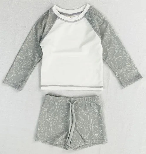 Maillot de bain garçon deux pièces | Maillot de bain été créateur pour garçons | Maillot de bain pour enfant | Maillot de bain garçon plage piscine | Maillot de bain à séchage rapide garçon | Maillot de bain confortable pour enfants | Maillot de bain garçon tendance été | Maillot de bain garçon à la mode | Maillot de bain enfant créateur été | Maillot de bain garçon avec design unique